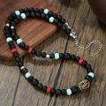 Collar de estilo étnico con cuentas de piedra volcánica negra y cuenta central retro - Estilo de Cuentas Étnicas Retro (ZJ14180)
