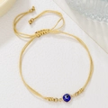 Verstelbare goudgeweven Evil Eye armband met blauwe kraal en metalen accenten - Gouden Touw Enkel Boze Oog Stijl (ZJ15083)