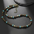Collier ethnique avec perles en bois de coco, accents turquoise et détails laiton - Perle en Bois et Style de Perle Carrée Cyan (ZJ12548)