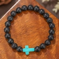 Heren kralenarmband van zwarte lavasteen met een detail van turquoise kruiskralen - Lavasteen met Turkoois Kruis (ZJ14080)