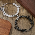 Matching magnetic couple bracelets with black and white beads and silver snake charms - Black and White Snake Magnetic Style (ZJ14373)