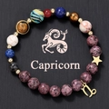 Detailed view of Capricorn natural stone beaded bracelet with golden star and zodiac charms - Capricorn