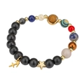 Detail of beaded solar system bracelet with Sagittarius and star golden pendants - Sagittarius