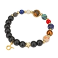 Solar system bracelet detail with natural stones and Taurus zodiac charm on white back - Taurus