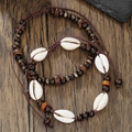 Set de bracelets de cheville bohème avec coquillages et perles sur bois sombre - Ensemble de Deux Pièces en Perles de Bois Coquillage (ZJ14673)