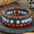 Three-piece bohemian beaded bracelet set featuring blue and brown wooden beads on rock - Retro Coconut Shell & Wood Triple Layer Style (ZJ14703)