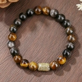 Macro shot of tiger eye and obsidian beads with a rectangular gemstone focal bead - Vintage Natural Mineral Style (8mm ZJ14238)