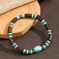 Boheems herenarmband met donkere houten kralen, turquoise accenten en bronzen tussenstukjes - Turkoois Hout Stijl (ZJ14945)