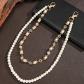Macro detail of double-layer hip hop chain with pearls and colorful rhinestone stars - Gold Tone Colored Rhinestone Flower Double Layer Style (ZJ14964)
