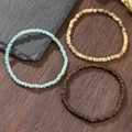 Set di bracciali bohémien in legno e cocco nei colori blu, beige e marrone naturale - Stile Perline Abaco Colorate a Tre Strati (ZJ15005)