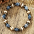 Bracelet bohème en pierres naturelles avec œil de tigre et perles en bois sur bois sombre - Style Bohémien Craquelé Bleu Et Grain de Bois (ZJ15110)