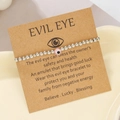 Detail of pink evil eye bead on silver beaded bracelet with minimalist gift card - Rose Pink (ZJ15640)