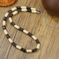 Collier pendentif taureau gothique avec perles en bois crème et fermoir argenté - Perles en Bois Beige Noir Marron (ZJ15158)