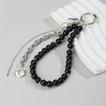 Detail of punk style keychain with black beads, silver chains and a cross pendant - Cross Coin Beaded Style (ZJ15967)