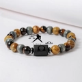 Detalle macro de la pulsera del zodiaco Libra en piedras naturales con cuentas ojo de tigre - Libra (ZJ15806)