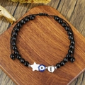 Perlenarmband mit schwarzen facettierten Perlen, Evil-Eye-Charm und silbernem Herzanhänger - Böser Blick Herz Schwarzer Perlenstil (ZJ15738)