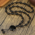 Gothic black onyx beaded necklace with round pendant and tassel on wood background - Retro Black Circular Pendant Style (ZJ15701)