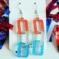 Macro view of interlocking red white and blue glitter acrylic chain link earrings - Glitter Triple Rectangle Style (5)