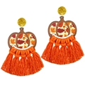 Close-up of bohemian pumpkin earrings with orange tassels and gold glitter studs - Maple Pumpkin with Bright Orange Tassel / 4