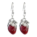 Detailed view of red anatomical heart earrings with silver hooks for Gothic jewelry - Anatomical Heart Style / Dark Red