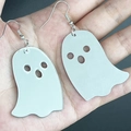 Close-up of white ghost acrylic earrings for Halloween held in hand showing size - White Ghost Expression (7)