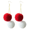 Detail view of red and white yarn pom-pom earrings with golden chain links - Red and White Knitted Pom Pom Style (5)