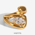 Macro view of gold-plated titanium ring with marquise-cut zircon and organic fluid design - Marquise Streamline Style (FT-JZ-398-8)