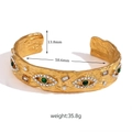 Hammered gold titanium bangle featuring green evil eye motifs and zircon accents - Open Bangle (FT-SZ153) / Gold