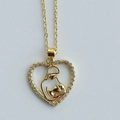 Golden heart necklace featuring a mother embracing baby design with white zircon pavé - Mother and Baby Hugging Heart Style (C)