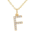Gold pendant necklace featuring a micro-paved crystal letter F on a delicate cable chain - Letter F