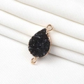 Detailed macro of black druzy teardrop pendant with gold plated edges and double rings - Double Loop 13MM*18MM / Black (P1308)