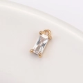 Macro view of rectangular clear crystal glass pendant with gold-plated claw setting - 4mm*8mm / White (P1727)