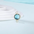 Close-up of a sky blue birthstone charm with golden double loops for DIY jewelry - Diameter 8mm / 10 Pieces Pack / Gold Edge-March (P1759)