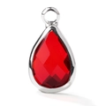 Close-up of a red faceted glass teardrop pendant with a silver metal frame for DIY jewelry - Silver Border December (P2294)