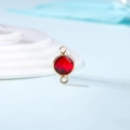 Close-up of a faceted red crystal birthstone charm with gold-plated double-loop connectors - Diameter 8mm / 10 Pieces Pack / Gold Edge-July (P2322)