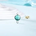 Macro shot of double-loop teal birthstone connector charm for DIY jewelry making - Diameter 8mm / 10 Pieces Pack / Silver Edge-May (P2310)
