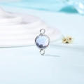 Detail view of double-loop round crystal connector for DIY jewelry in light blue - Diameter 8mm / 10 Pieces Pack / Silver Edge-June (P2311)