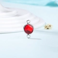 Macro view of a red crystal birthstone connector with dual loops for DIY jewelry - Diameter 8mm / 10 Pieces Pack / Silver Edge-July (P2315)