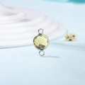 Macro shot of circular dual-hole silver connector with yellow faceted crystal stone - Diameter 8mm / 10 Pieces Pack / Silver Edge-November (P2320)