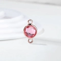 Macro view of a faceted pink crystal birthstone charm in a rose gold dual-loop setting - Diameter 8mm / 10 Pieces Pack / Rose Gold Edge-October (P2413)