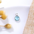 Detailed view of sky blue 6mm birthstone crystal pendant with silver metal bezel setting - 6mm / Silver - Sky Blue (March)