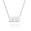 Macro detail of silver titanium steel angel number 666 pendant on a link chain - Style 666 / Steel