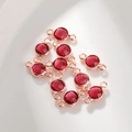 Detail van 12 kleuren 6 mm geboortesteen hangers met donkerrode kristallen voor DIY-sieraden - 6mm / Rozegoud Oktober (P2458)