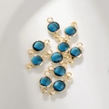 Dettaglio dei ciondoli pietra portafortuna blu scuro da 6mm con doppio occhiello per gioielli DIY - 6mm / Bordo Oro Dicembre (P2476)