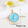 Detail view of round gold lightning pendant with blue enamel and 1.9cm height scale - Blue Lightning Style (A0211)