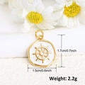 Detail view of a white enamel helm charm with gold finish including size and weight specs - White Ship Wheel Style (A0212)
