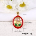 Detail view of gold-plated tulip pendant with dimensions 2.1cm by 1.6cm and red enamel - Red Border Pink Tulip Style (A0288)