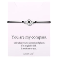 Detailed view of woven compass bracelet on a white gift card with sentimental text - Silver Compass Rose Braided Bracelet (B2946-Bracelet)