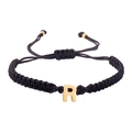 Handmade woven black rope bracelet featuring a polished gold-plated initial R charm - Black Rope R (B2925-R)