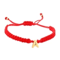 Detail of red braided cord bracelet featuring a gold letter A charm and adjustable knot - Red Rope A